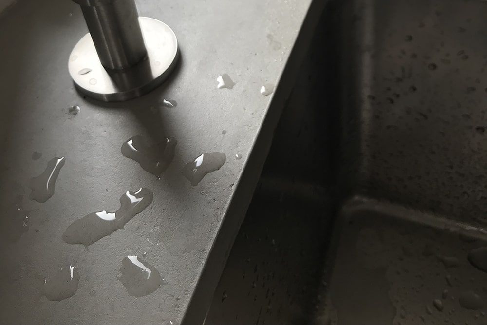 Microcement overlayed sink protected and waterproofed with Cerbero Sealer