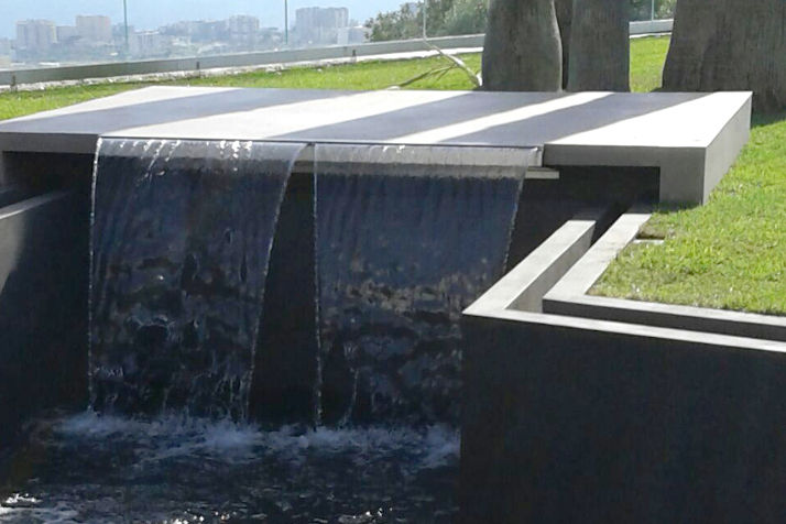 Artificial waterfall in a pool lined with Poseidone