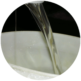 Waterglass while pouring into bucket