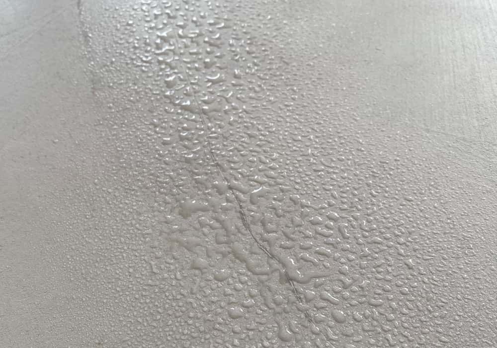 Water-repellent effect of Micromed protective wax on a Microbond floor